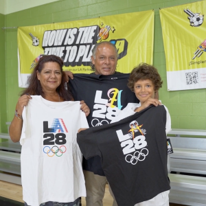 People holding t-shirts 