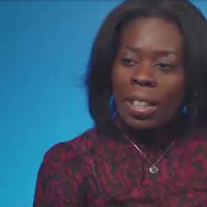 Baaba Jackson-Kuofie, a blue screen behind them.