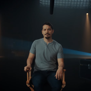 Person sat in a chair on a film set