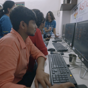Person sat at a computer 