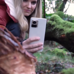 Cat Capon taking a photo on her phone