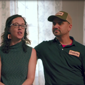 The Santoros seated in a play room.