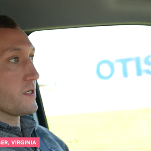 Otis employee driving EV