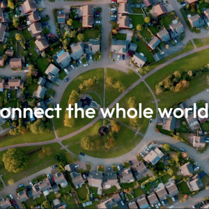 Birds eye view of neighbourhoods with the text 'Connect the whole world' in the centre