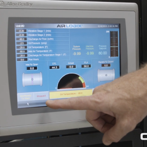 Person pointing to a touch screen