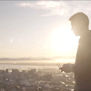 A person flying a drone