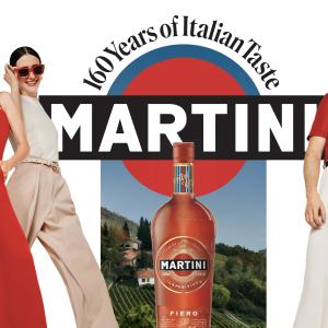 People smiling and laughing surrounding the Martini logo and bottle.