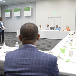 People sat around a table during the second annual CDFI Convening