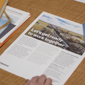 Piece of paper on a table with the title 'let's get ready to work together"