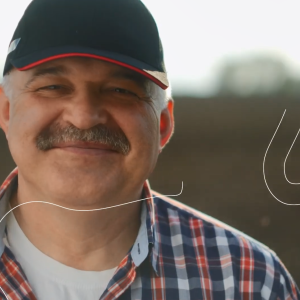 A person smiling at the camera.