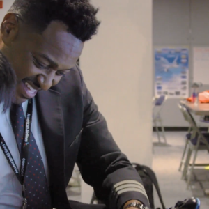 Quincy working with a student.