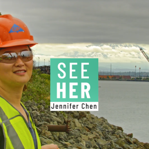 Jennifer Chen outside with a waterway and industrial machinery behind her. "SeeHer Jennifer Chen".