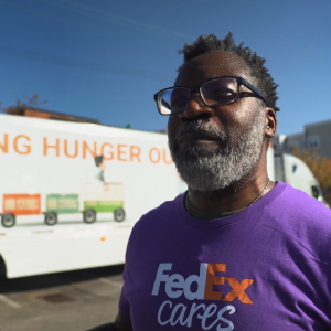A volunteer at a food drive.
