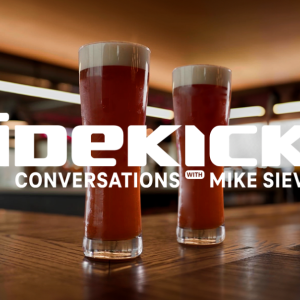 Glasses of beer with text overlaid that reads, "Sidekicks: Conversations with Mike Sievert"
