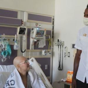 Calvin Johnson visiting patients at the Aflac Cancer and Blood disorder center of Children's Hospital, Atlanta.