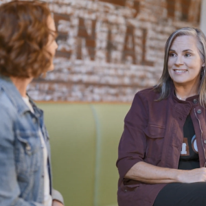Julia White and Dayna Eberhardt talking.
