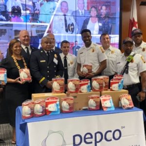 Group posed with donated smoke detectors.