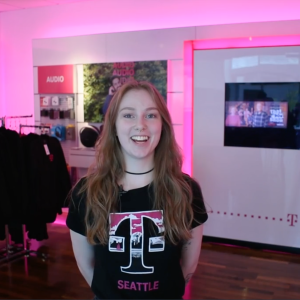 T-Mobile employee in a T-Mobile Seattle T-shirt