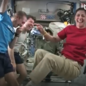 TCS Empowers - people floating in zero gravity