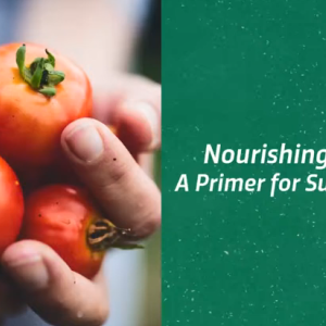 "Nourishing the World" and a hand holding small tomatoes.
