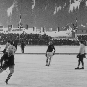 Black and white footage of the first ice hockey olympic games.