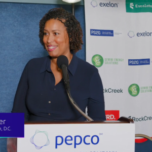Mayor of DC speaking at a podium with Pepco sign