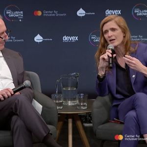 two people on stage talking