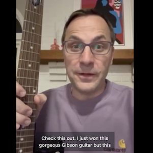 Check this out. I just won this gorgeous Gibson guitar.