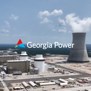 "Georgia Power" over an aerial view of a nuclear power plant.