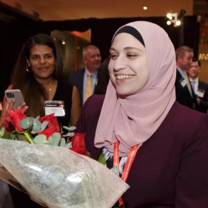 Ahlam Antar holding flowers