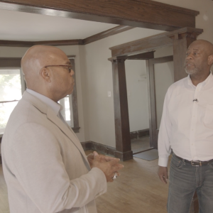 two black men in a new home