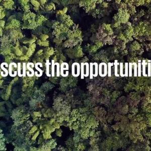 "discuss the opportunities" over an aerial view of a dense tree canopy.