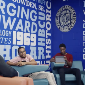 3 students sitting