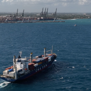 barge carrying shipping containers 