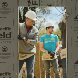 People building a home.