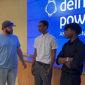 Three people stood together 