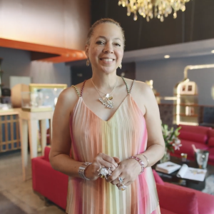 Dorian Webb standing in their store.