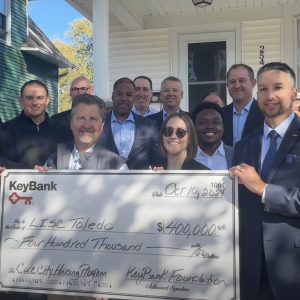 LISC and KeyBank Leadership shown with the $400,000 grant check.