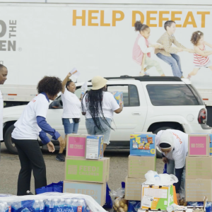 Volunteers stack boxes