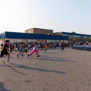 Students surprised and running to new bikes