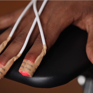 Hand getting blood oxygen levels measured 