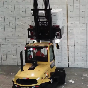 A forklift raising boxes