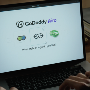 Laptop with GoDaddy Airo on the screen