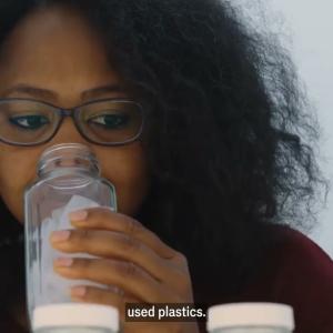 Person drinking out of a bottle