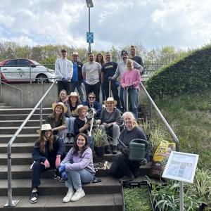Equipped with shovels, gloves, and watering cans, the group spent the day planting a total of 412 new plants and sowing flower seeds.