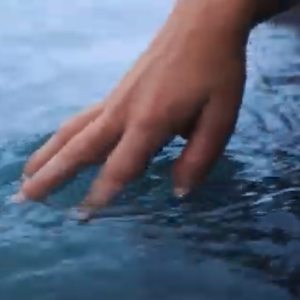 A hand in water