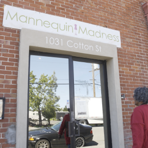 Person walking into Mannequin Madness