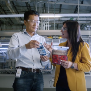 two people looking at products