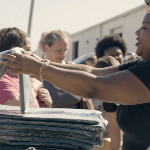 Volunteers handing out packages