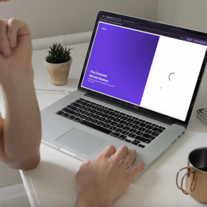 Person looking at open laptop
